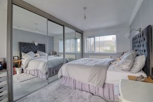 Bedroom One- click for photo gallery